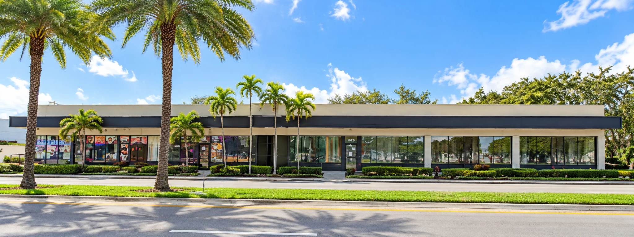Presentation-cleaned street-facing view of the researched retail property at 1020 N Miami Beach Blvd